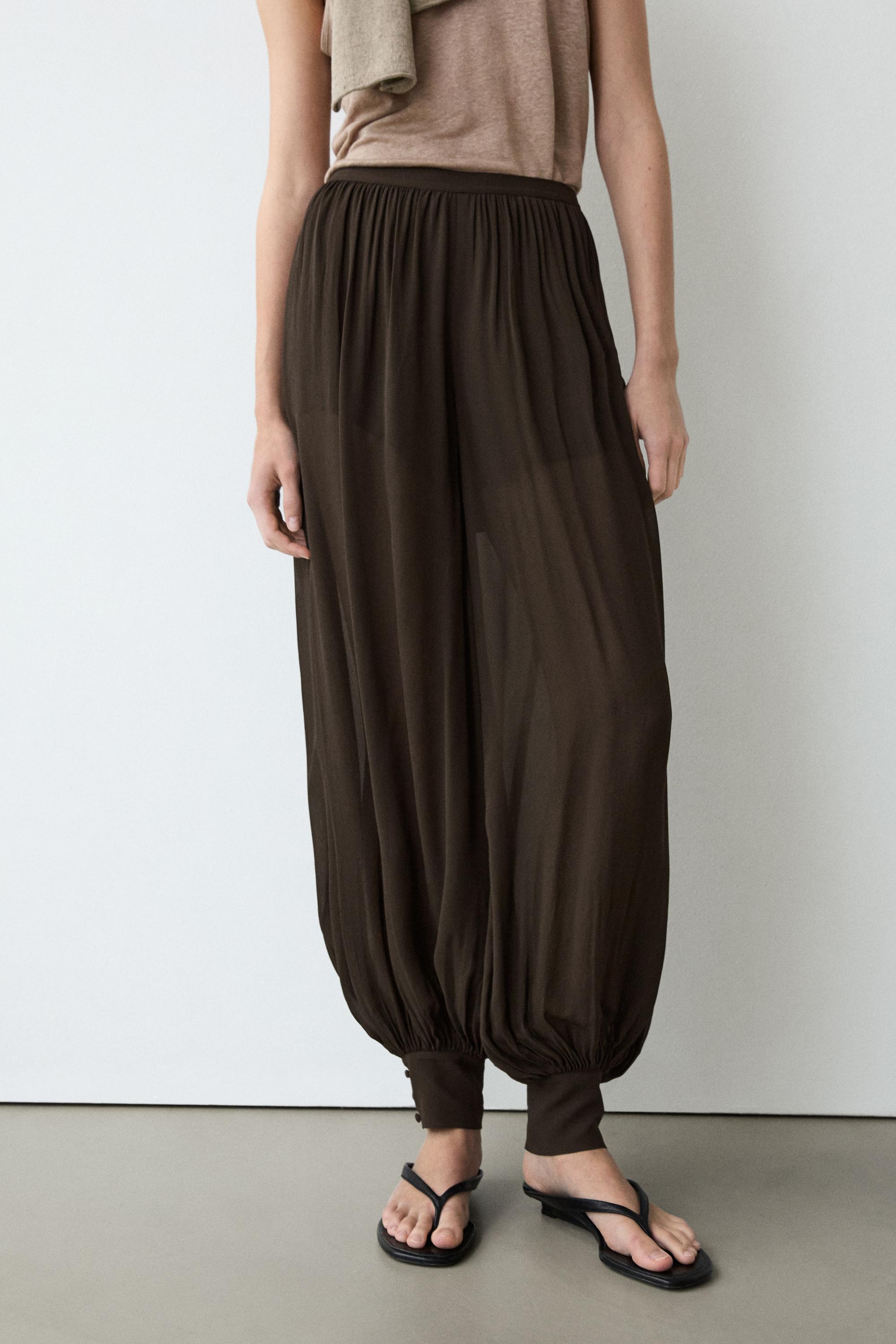 Pantalon bouffant semi-transparent avec boutons